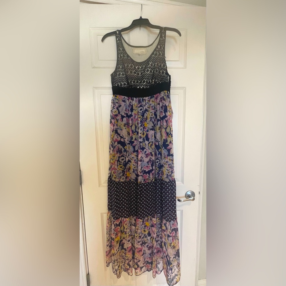 Areve maxi dress. Lined to knee length, sheer material below knees.